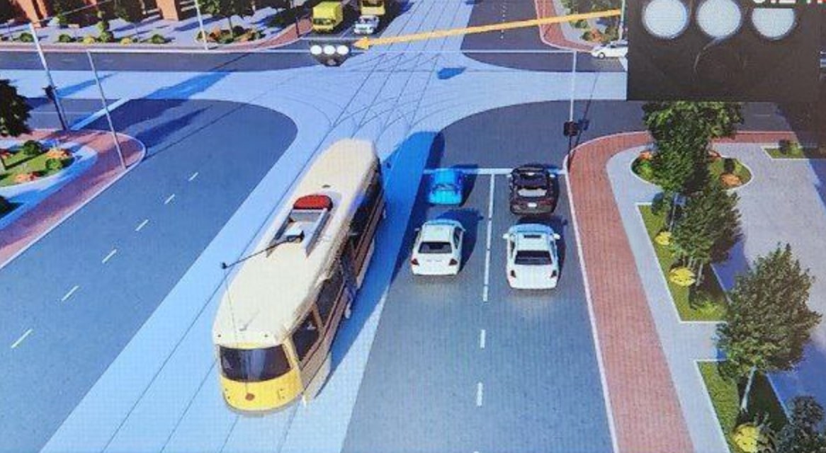 Ushbu svetofor tramvayga qaysi yo'nalishda harakatlanishga ruxsat beradi? — YHQ savoli uchun rasm
